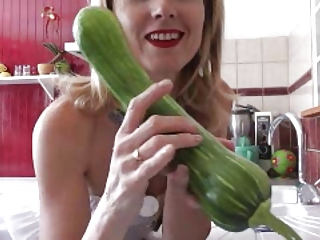 Naomi1 In A Kitchen With A Vegetable