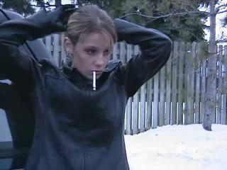 Smoking Girl in Leather Jacket and Gloves 2