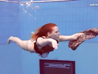 Crunchy overheated hair girl swims in her panties tubes