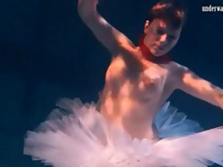 Ballerina in a tutu filmed underwater tubes