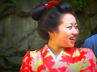 Asian grown-up gal in kimono